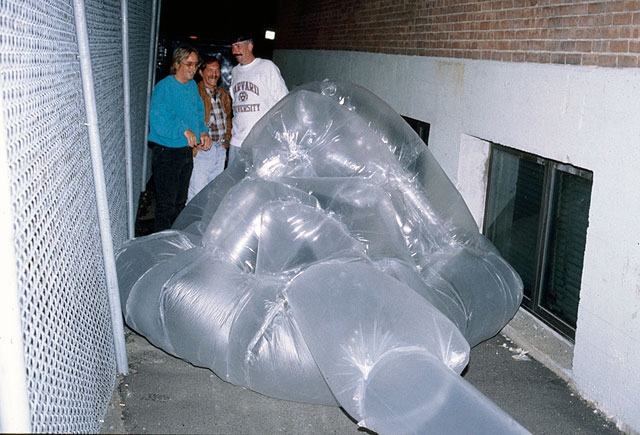   Bill S., Freddie F., and George L. with Freddie’s  para SITE shelter. An avid science fiction fan, Freddie requested a shelter in the shape of Jabba the Hutt.  