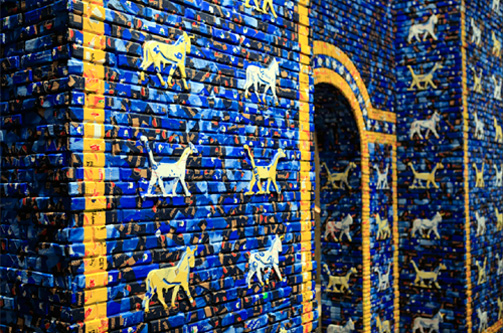 Installed in the entrance of the exhibition space at the Haus Der Kulturen Der Welt, May the Arrogant Not Prevail is a scaled-down reconstruction of the reconstruction of the Ishtar Gate still standing in Iraq. Built by a Berlin-based team of assistants out of plywood and wooden beams, and clad with color-correct packaging of Arabic foodstuffs found in Berlin, the gate extends many of the material themes and conceptual concerns of The invisible enemy should not exist , but, just like the title, serves as an alternate translation. 