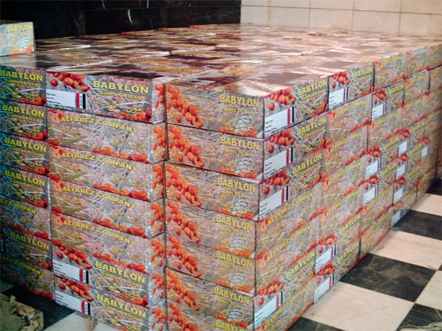 In the store I displayed pictures of the harvest, which Al Farez sent me. The dates were packed and ready to ship via Jordan in early October. They traveled by truck along the most dangerous road in the country, then waited in a line of cars at the Jordanian border that was reported to be four days long, as hundreds of thousands of Iraqis tried to flee the worsening sectarian violence. After sending the truck back to Baghdad for a radiation certificate, the Jordanians finally refused the cargo as a security concern. The exhausted truck driver then headed north to Syria and dropped off the dates at the airport in Damascus, where they were to get on a plane to Egypt, then onward to the US. The shipment was held there for a week, and was by then so blistered from three hot weeks in a truck that Al Farez deemed it unacceptable for export. So the shipment died in Syria.