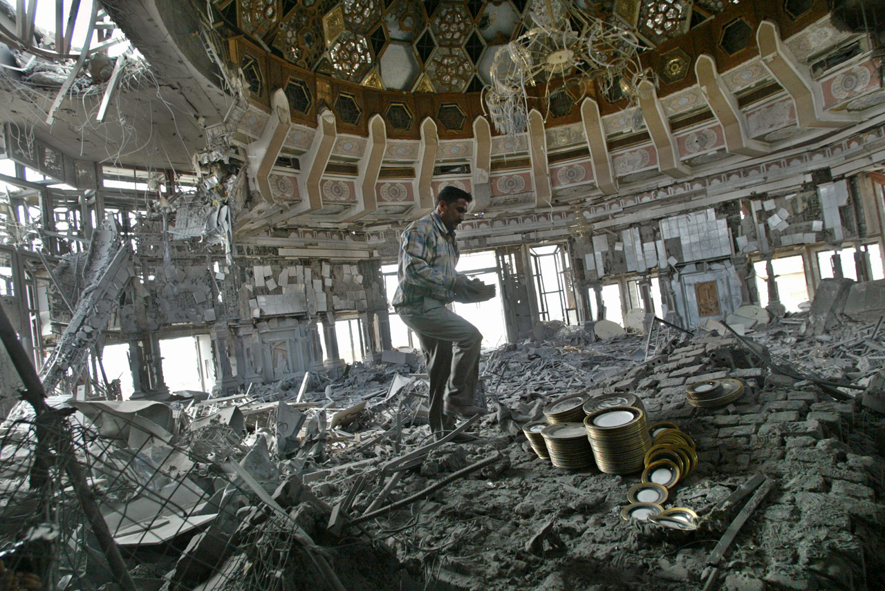     The dishware was looted from Saddam’s palaces after they were destroyed by Coalition Forces. Personal household items such as plates and silverware were taken by Iraqi citizens, many of whom used them in their own homes—a dispersal of power.     