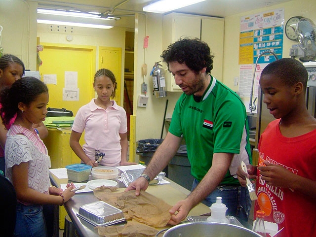 Making baklawa. Other dishes made with these students include kubba bamia, a meat dumpling stew served with okra over basmati rice.