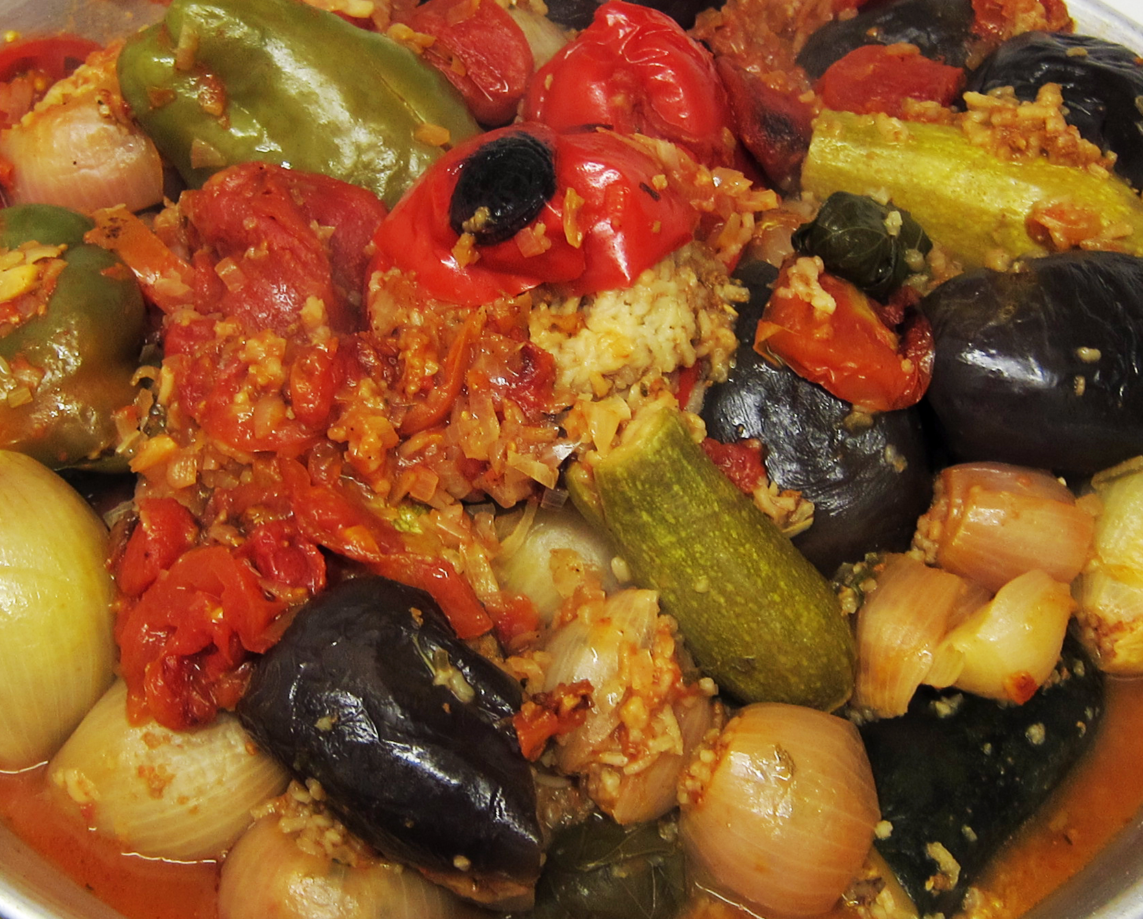   Mhasha , a dish consisting of stuffed grape leaves, aubergines, courgettes, peppers, onions and tomatoes. Cooked and served on the final night, May 7, 2013.    