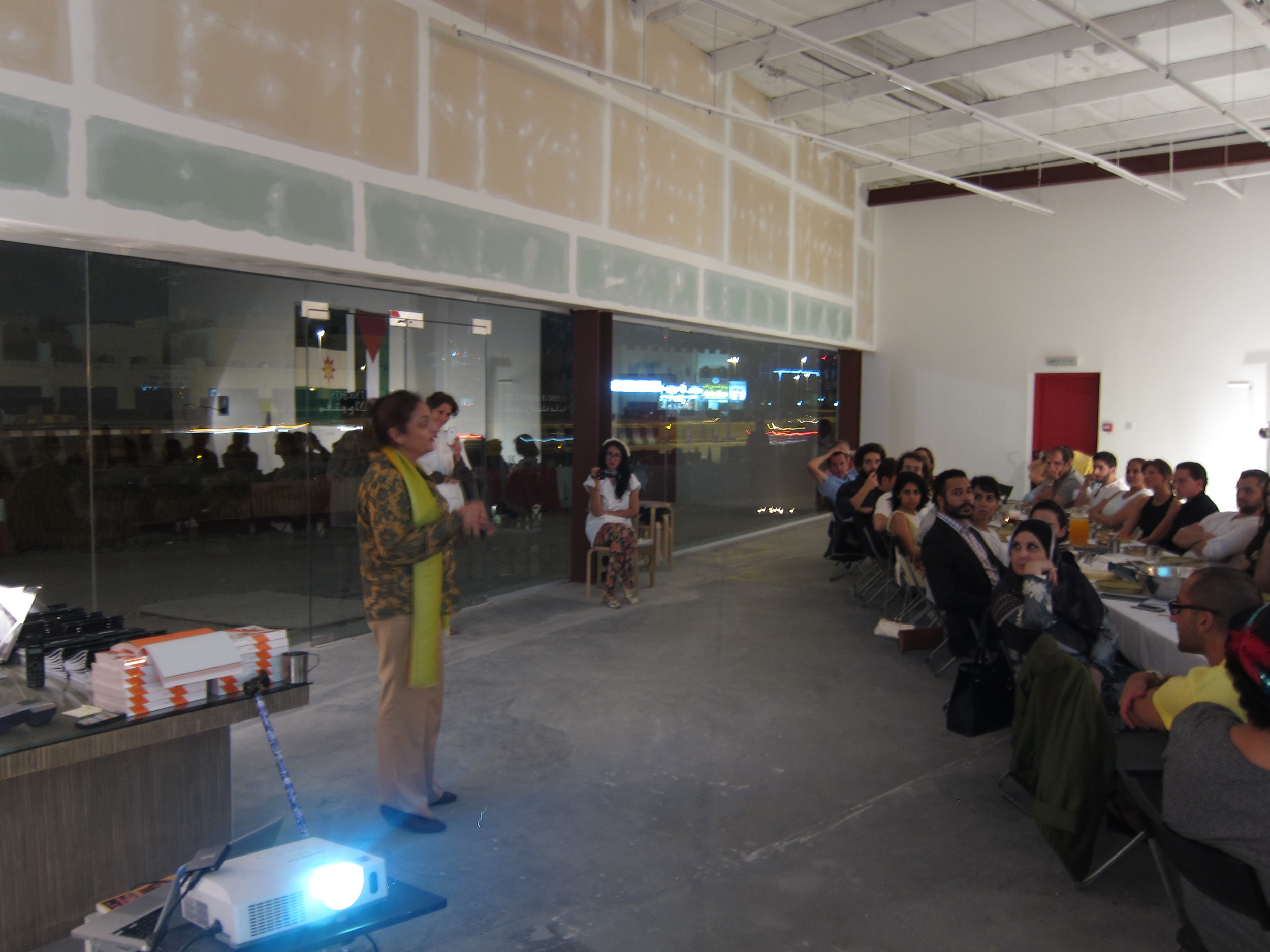   Dr. Ella Habiba Shohat delivering a typical Iraqi Jewish greeting before the meal to diners at  Dar Al   Sulh.     