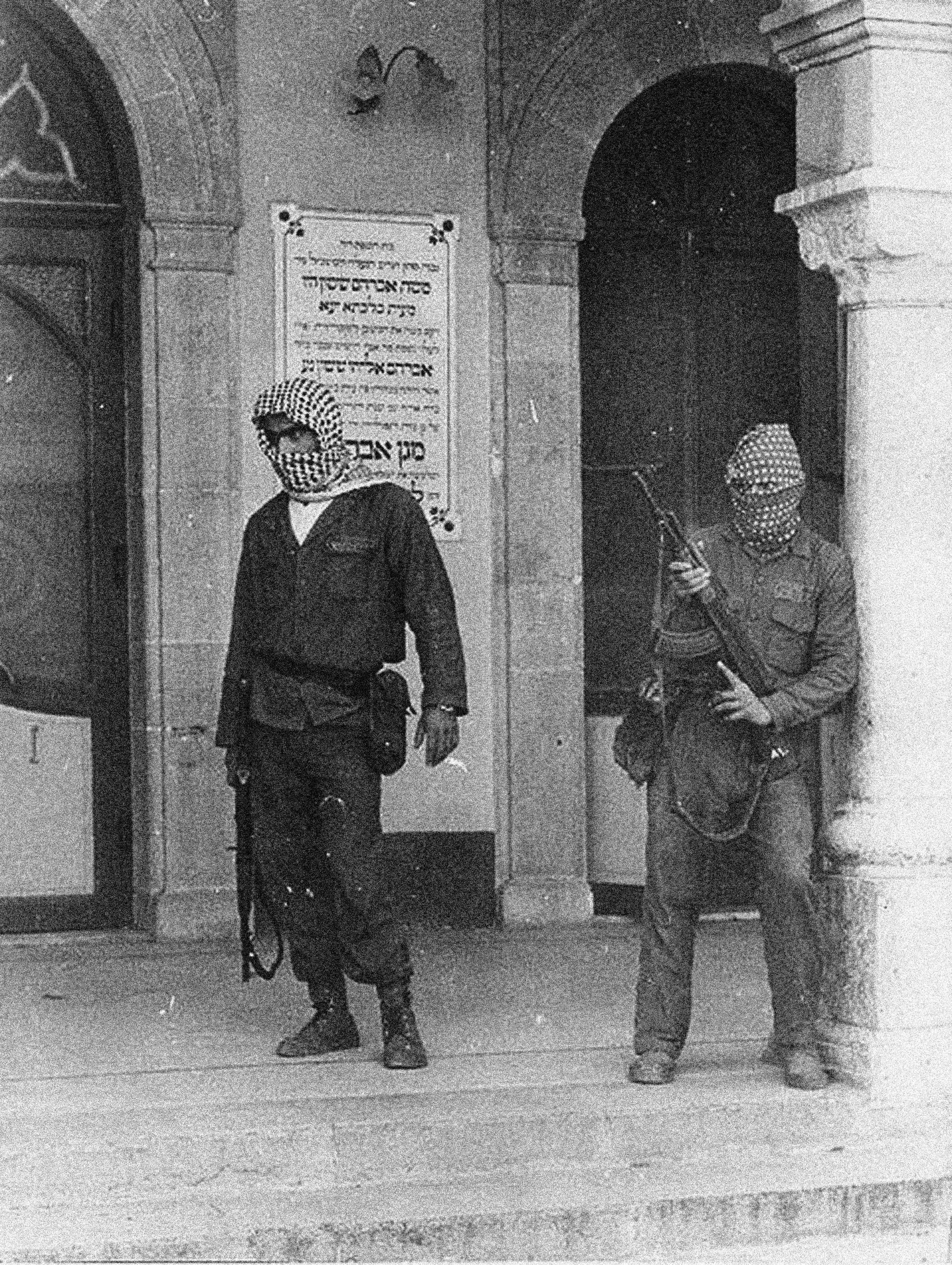  A single photo adorned the walls of Dar Al Sulh: Palestinians protecting the Maghen Abraham Synagogue in Beirut during the Lebanese Civil War in 1975. The image serves as a surrogate for others that do not seem to have been documented, of the Muslim