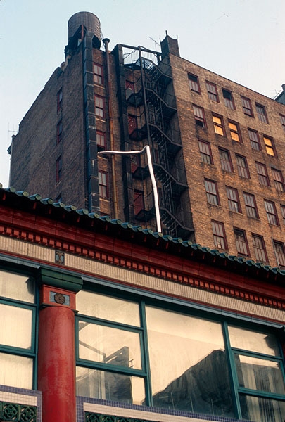In August 2001, TriBeach Holdings, LLC, opened floors six through eleven of 129 Lafayette Street in Manhattan as the site for a temporary exhibition. Curators were each given a floor of the building with which to work. The exhibition, entitled GZ:01 , was staged to raise visibility of this vacant building for real estate purposes. Formerly functioning as a large, multi-story community center and business network for the local Chinese community, 129 Lafayette Street was regarded as a prime location for extending SoHo’s gallery scene into a new area.