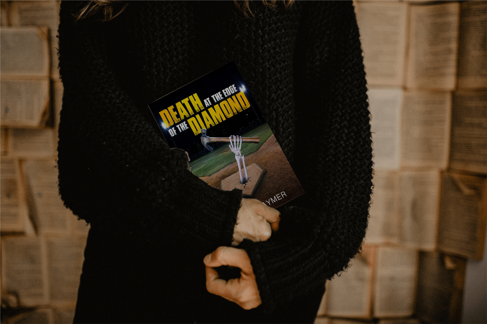 Person holding Death at the Edge of the Diamond