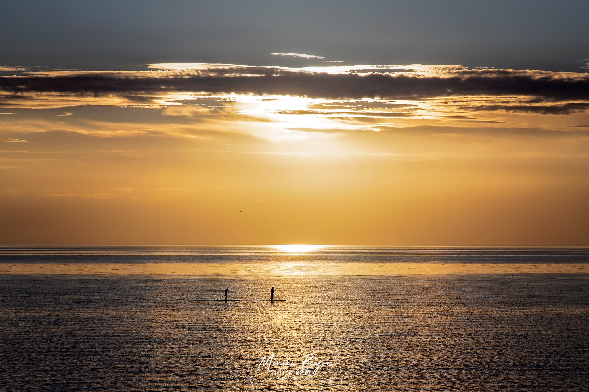 01-sunset-sea-norfolk-coast-surfers-ocean-monika bajor-photography.jpg