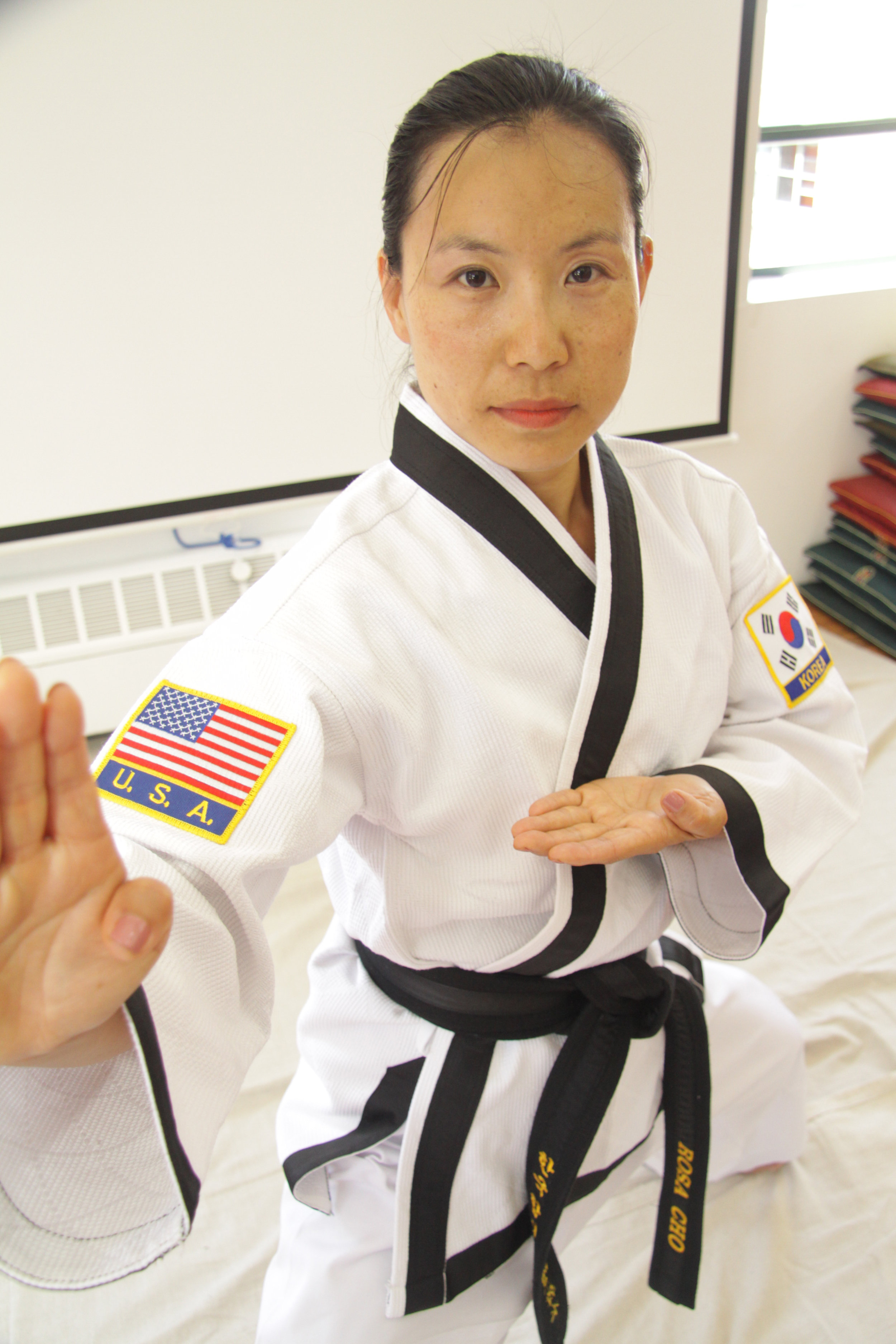 Senior Instructor Rosa J. Cho has been studying HapKiDo under Master Herbert at WMAC since 2001 and is a 2nd degree black belt. She has also studied wushu, kickboxing, yoga and swing dancing. Believing in the power of achieving health through empowering one’s mind, body and soul, she brings a lot of positive energy and enthusiasm to every class and cares for each student’s paths to well-being and empowerment. Rosa recently earned a Ph.D from the NYU Silver School of Social Work, and is working on socioeconomic justice and women’s rights issues. 