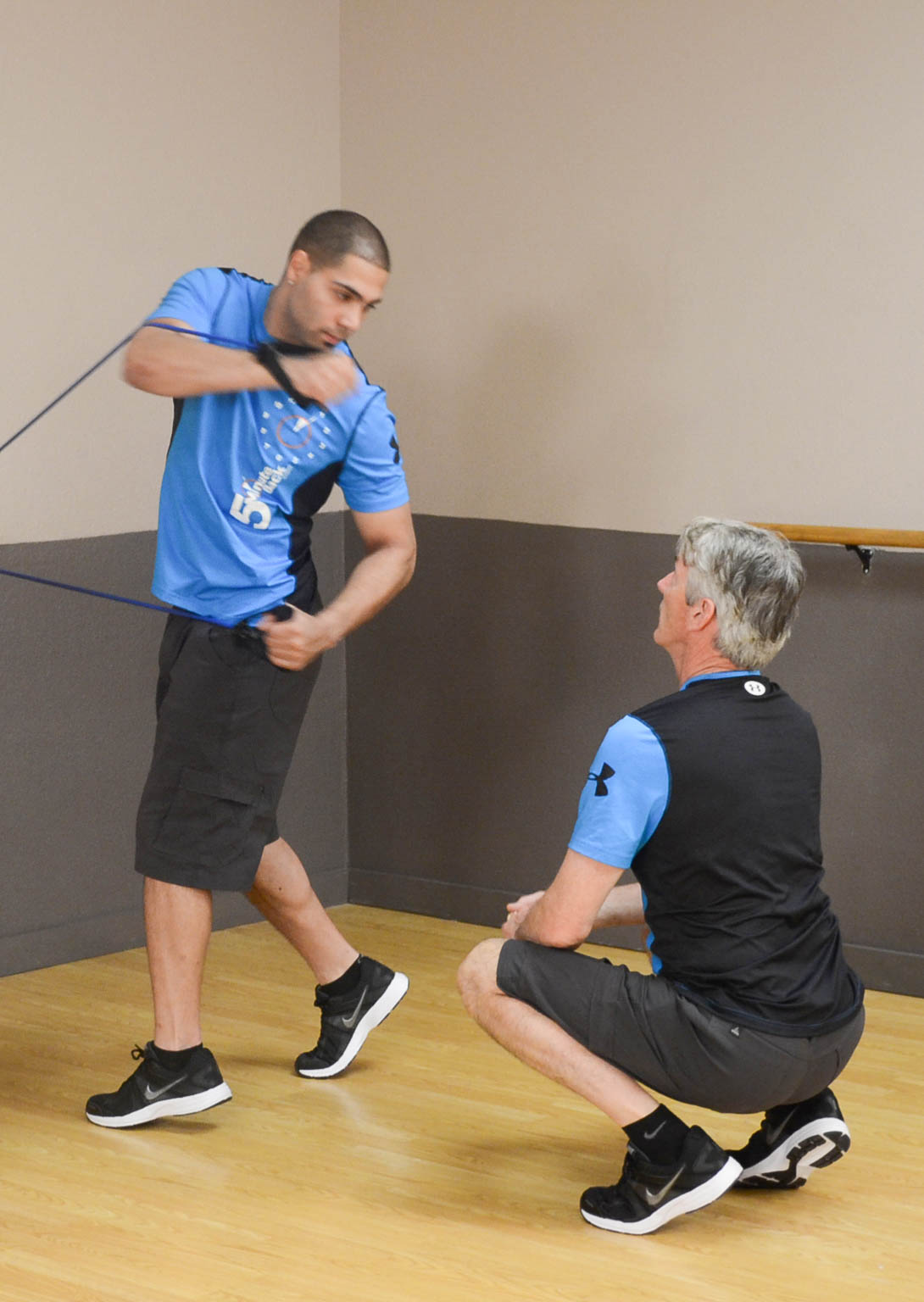 Instructor Teaching Patient 5MinuteBack Workout