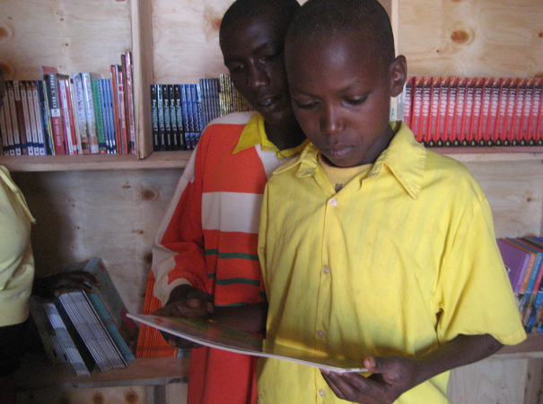 Most rural students, their families and their teachers had never had access to books (other than textbooks) before. At this level, learning to read begins with learning how to open a book, and how to turn a page.
