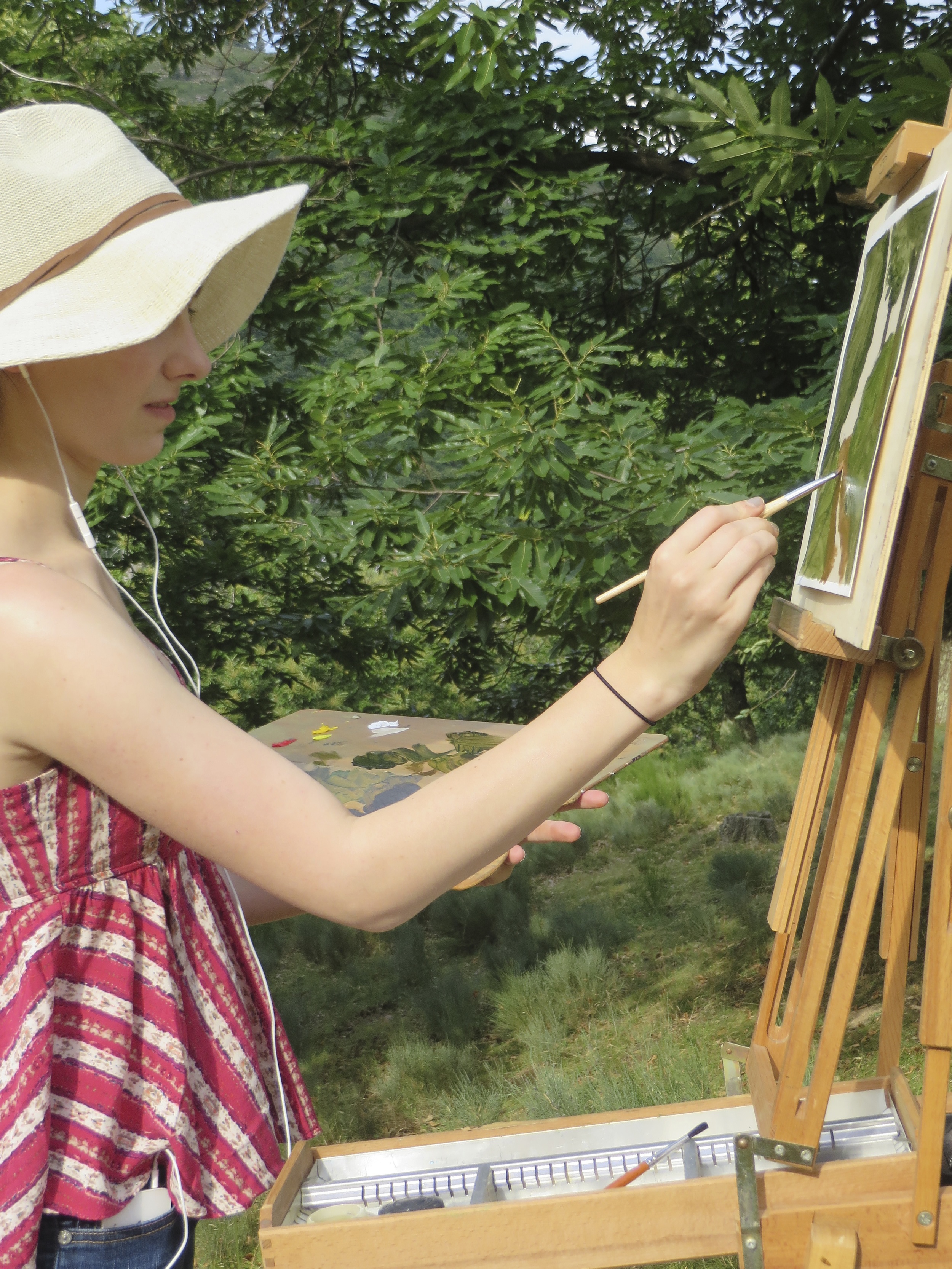 a student painting en plein air