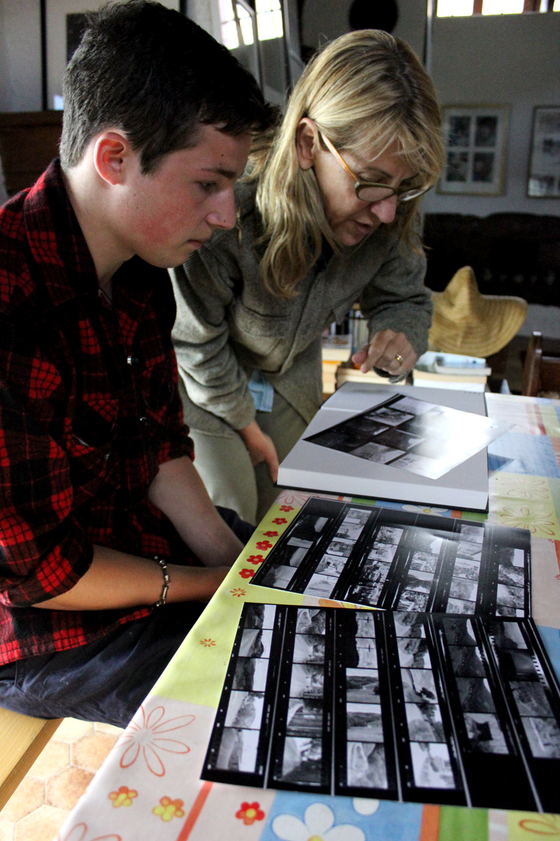 A student reviewing his contact sheets