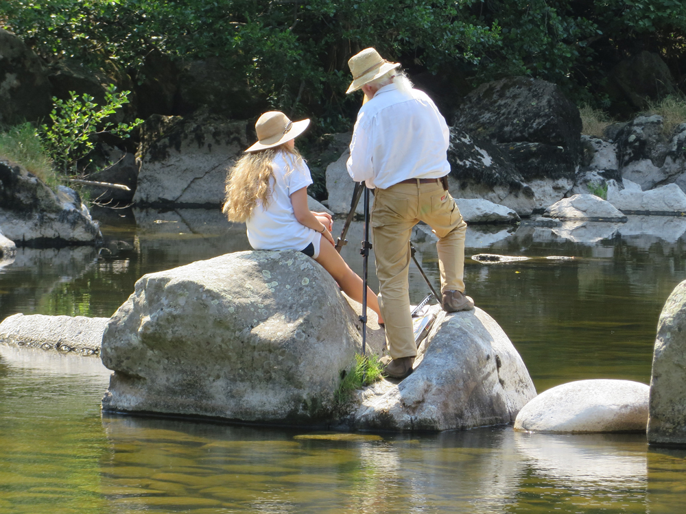high school student painting plein air with instructor at les tapies summer programs