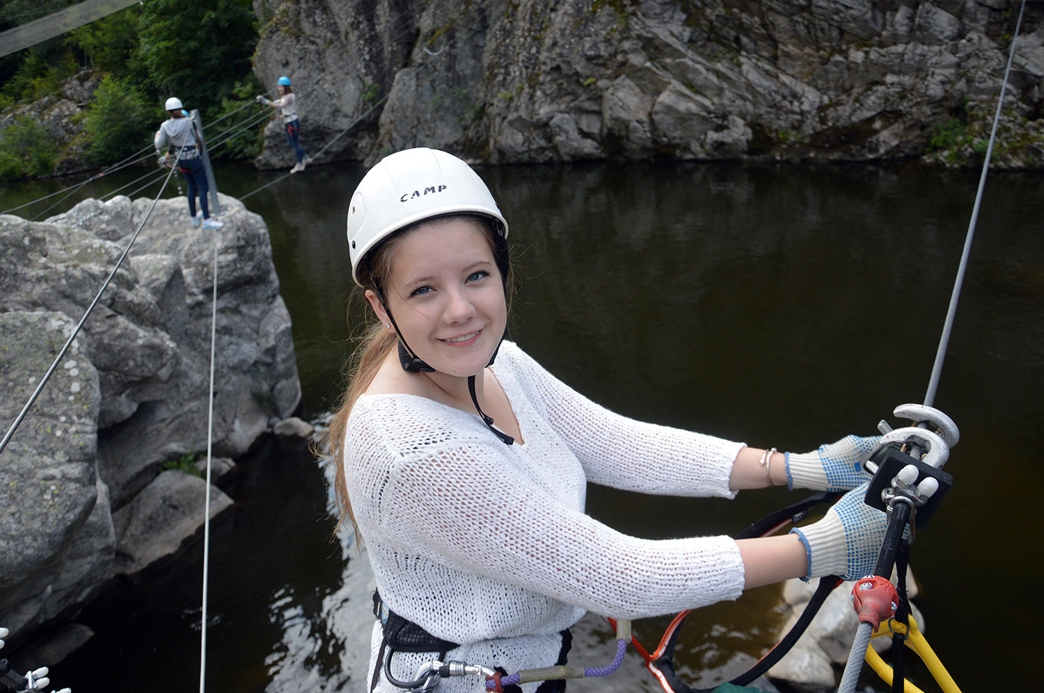  student on a high ropes activity at les tapies summer programs 