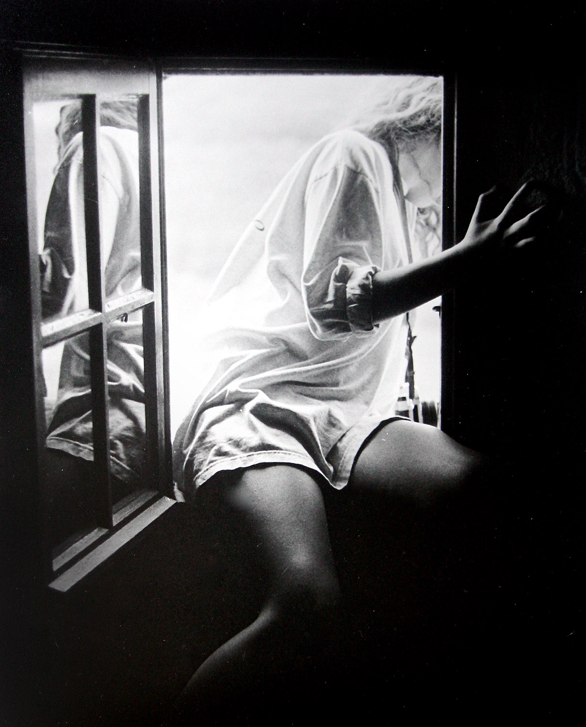  student black and white film photography girl in a window&nbsp; 