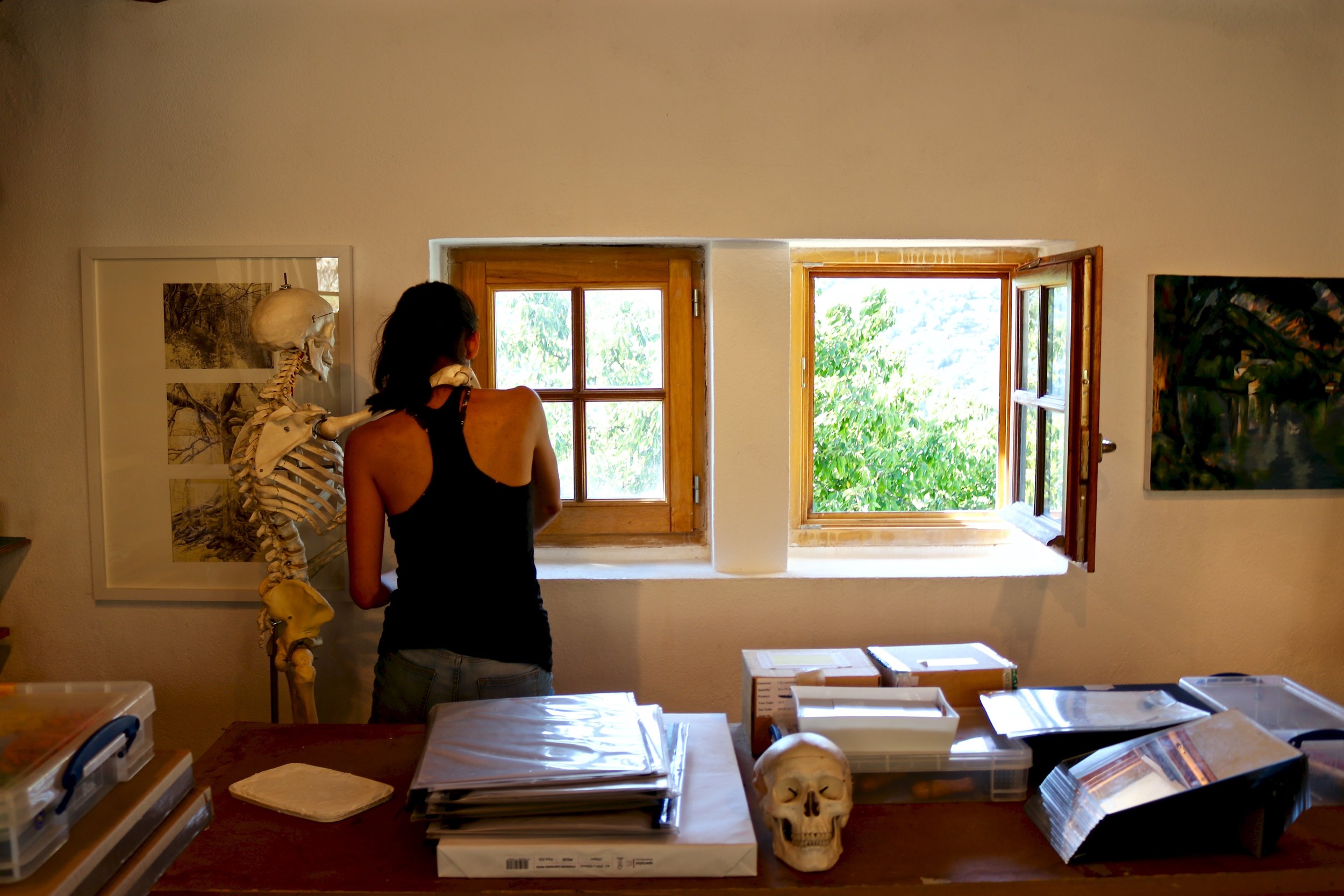  Some touch-ups to the walls have been added to lighten the rooms up. Here's Camila getting a helping hand from our resident skeleton. 