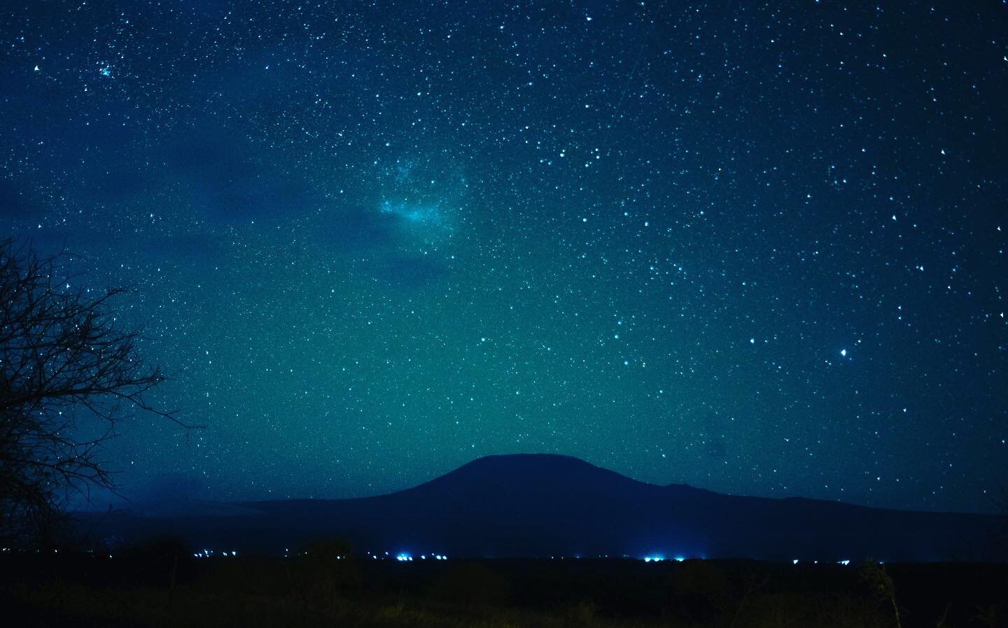 Mount Kilimanjaro leaves me speechless at every moment of the day, this sight with the stars took the feeling to another level. An Amazing time sleeping &amp; waking up to this view at @sataoeleraicamp. Book this experience with @travelplugkenya !