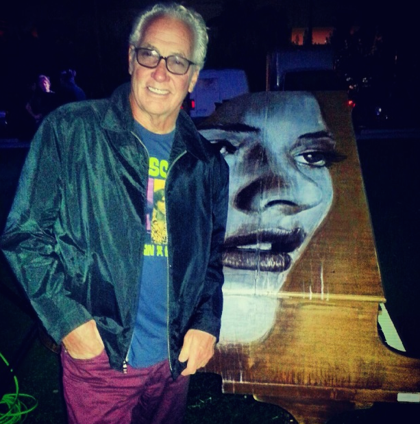 Garland and a Pop Up Piano Miami Charity Piano.png
