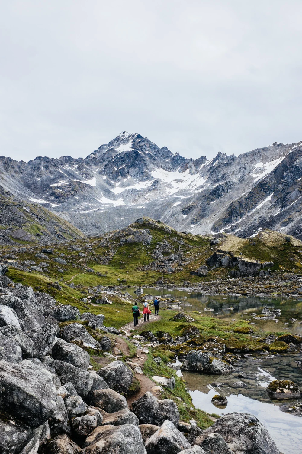 Approaching the mountain in the distance, Lynx Peak.