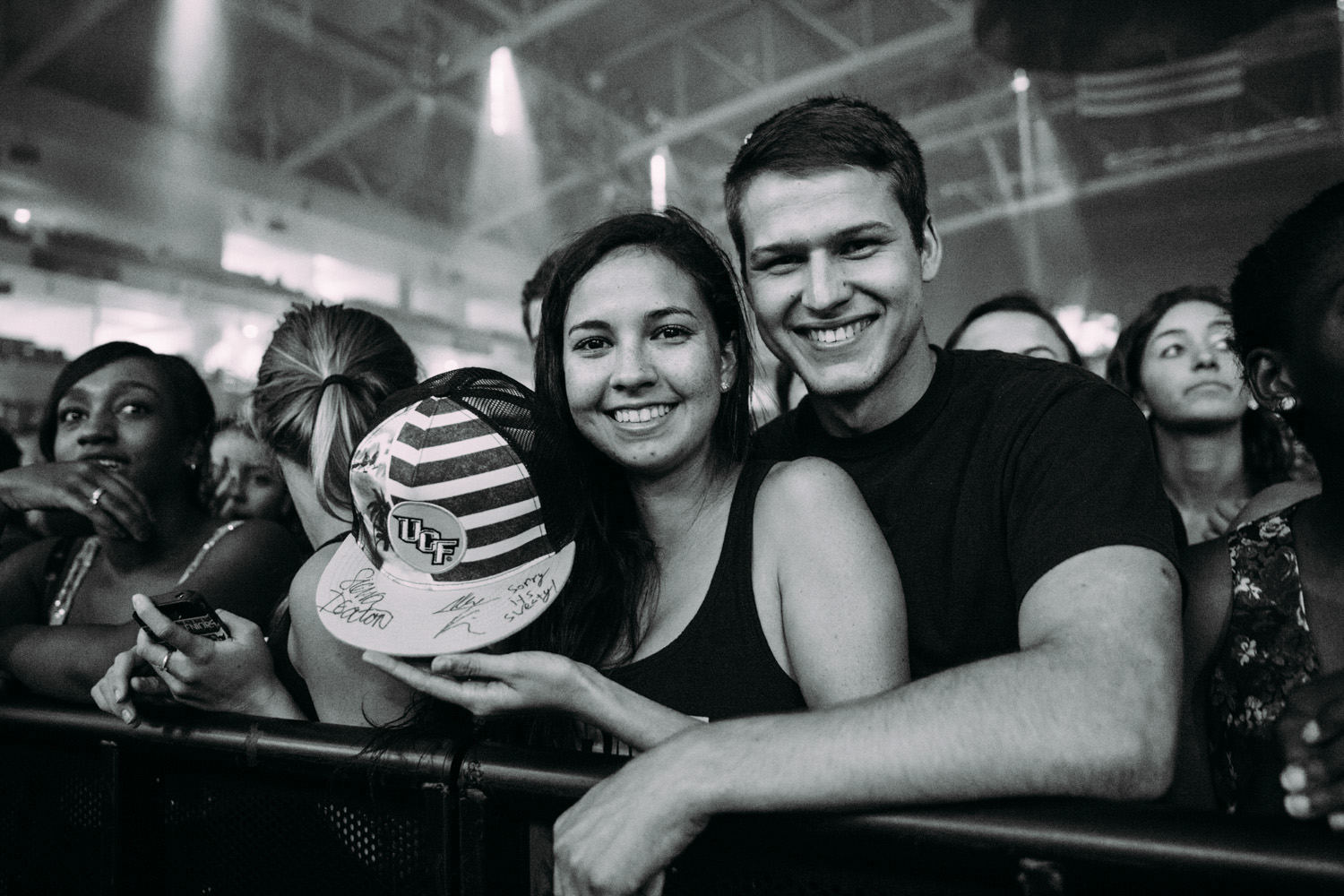 These two tossed their UCF hat on-stage and got it signed.