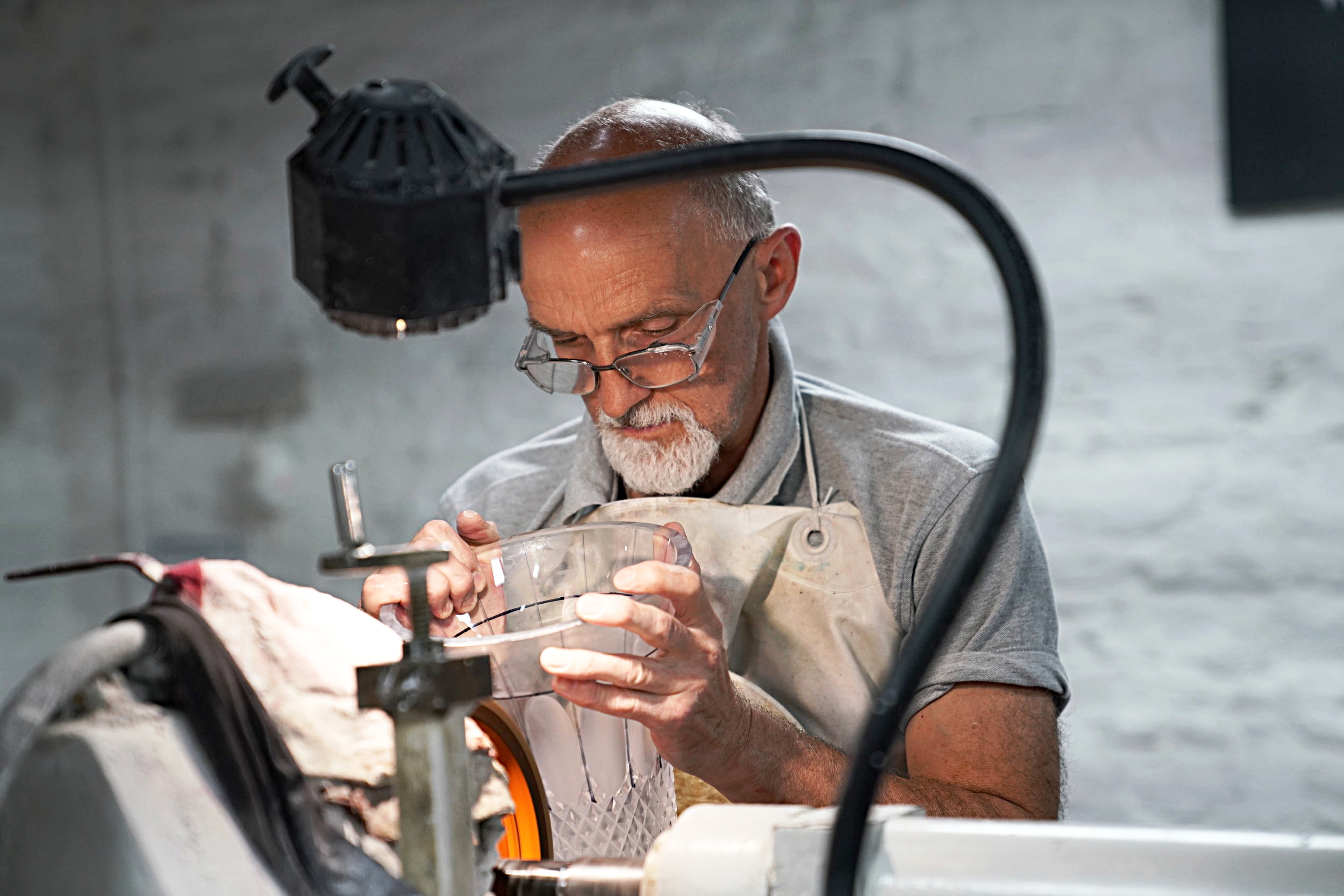  A master craftsman at work in the Waterford Crystal factory.  