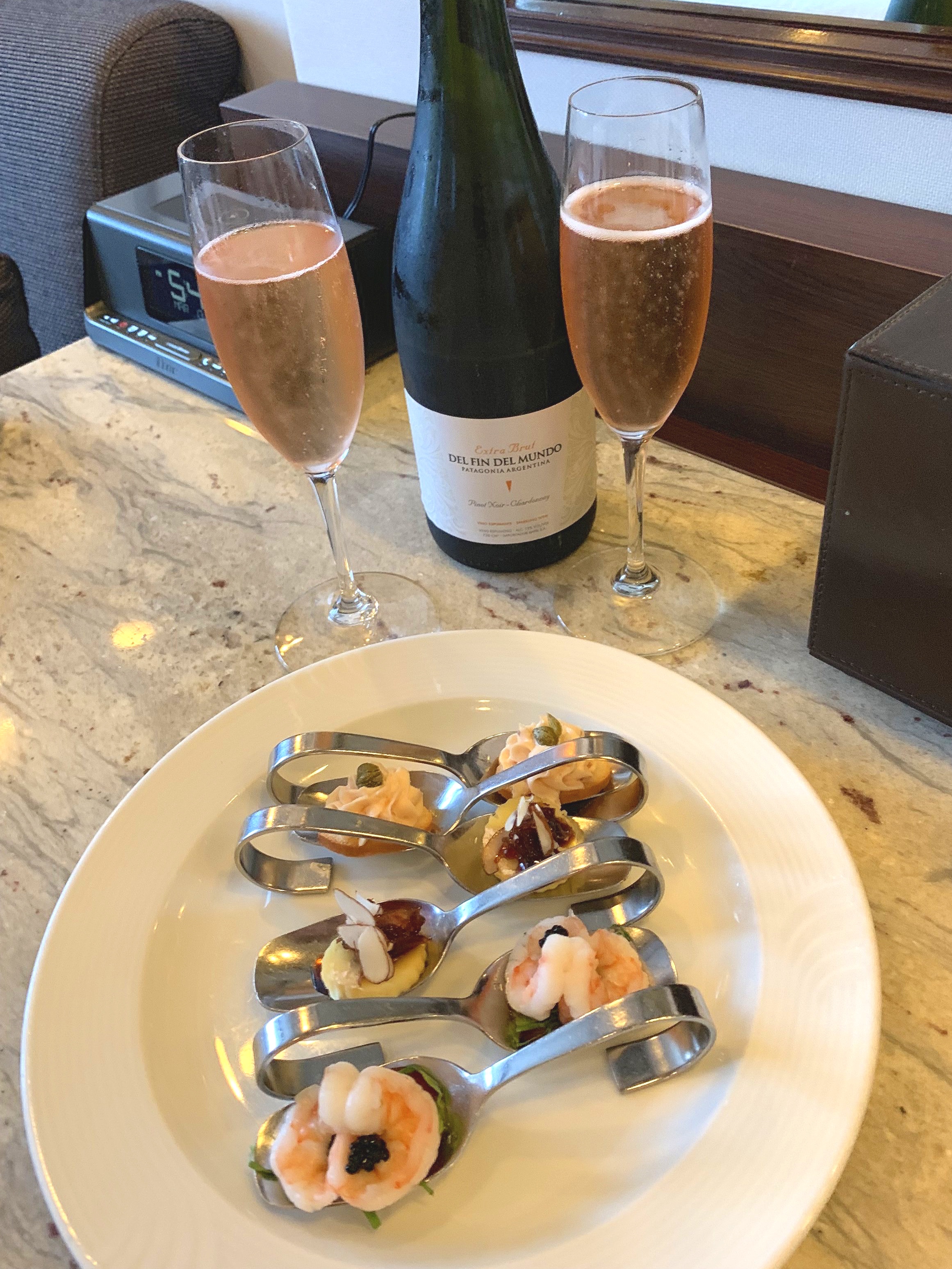  Champagne and canapés were waiting for us in our suite upon our return.  