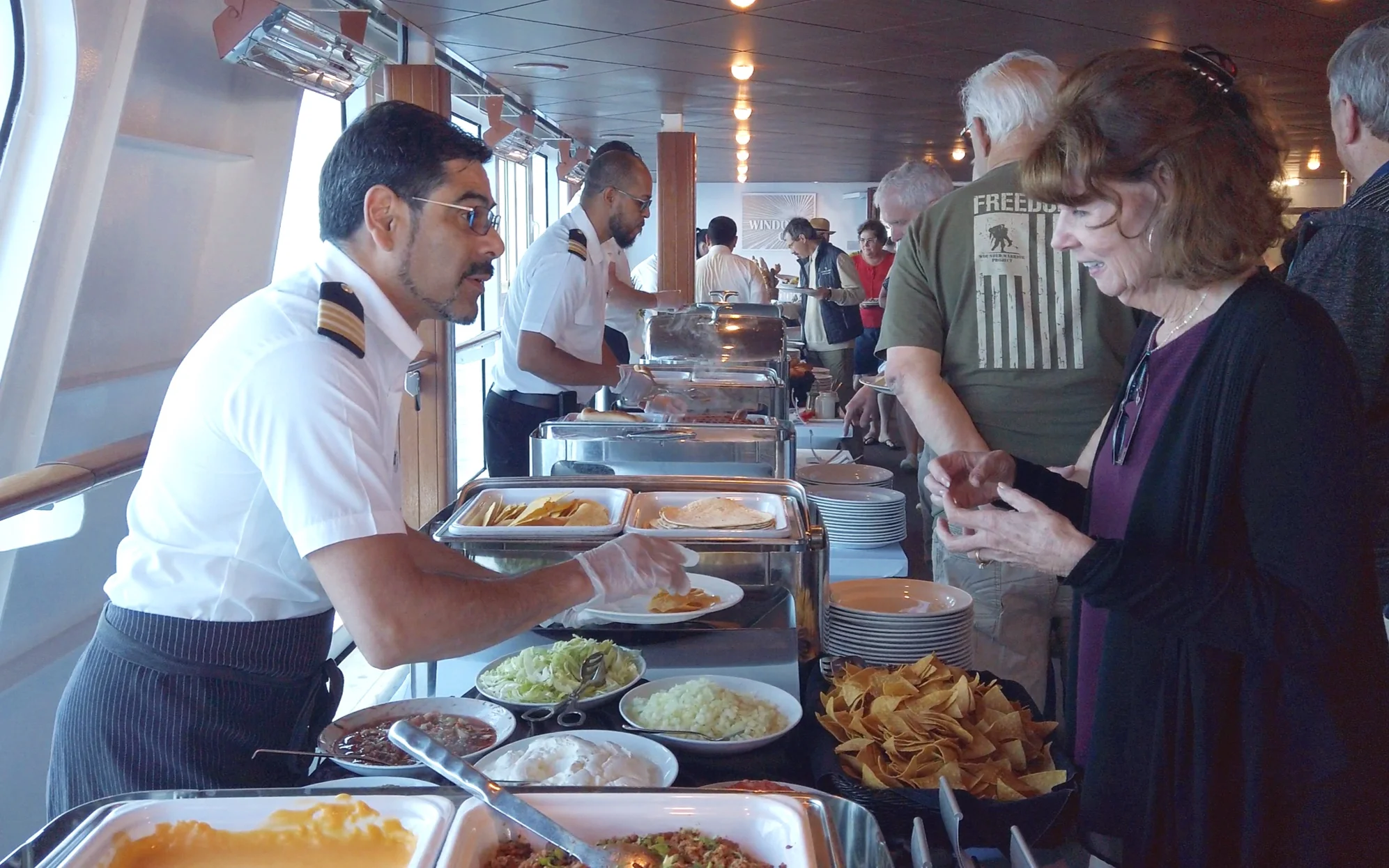 The Officers serving us our barbecue accompaniments.