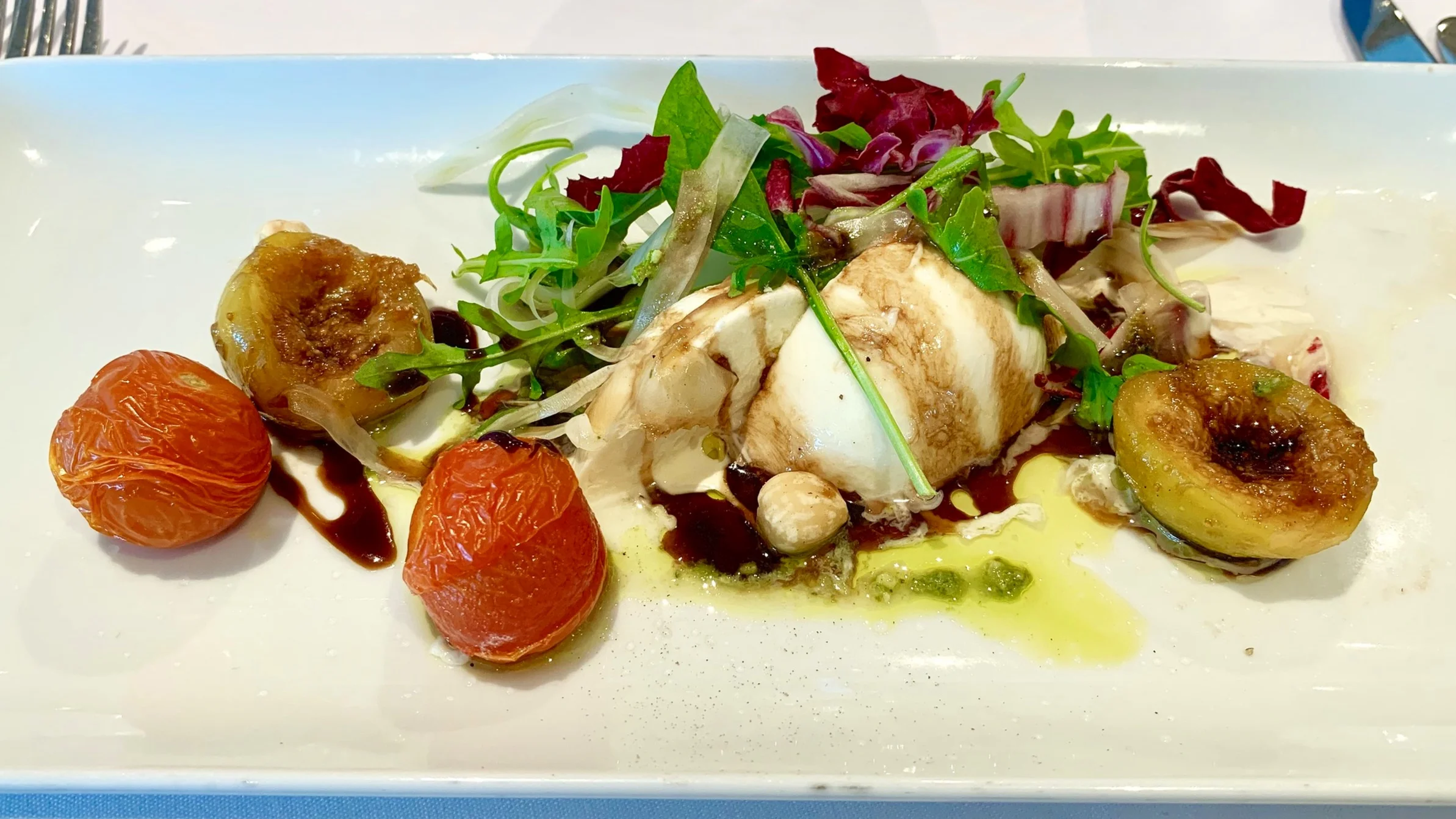 Delicious mozzarella, tomato and fig salad starter