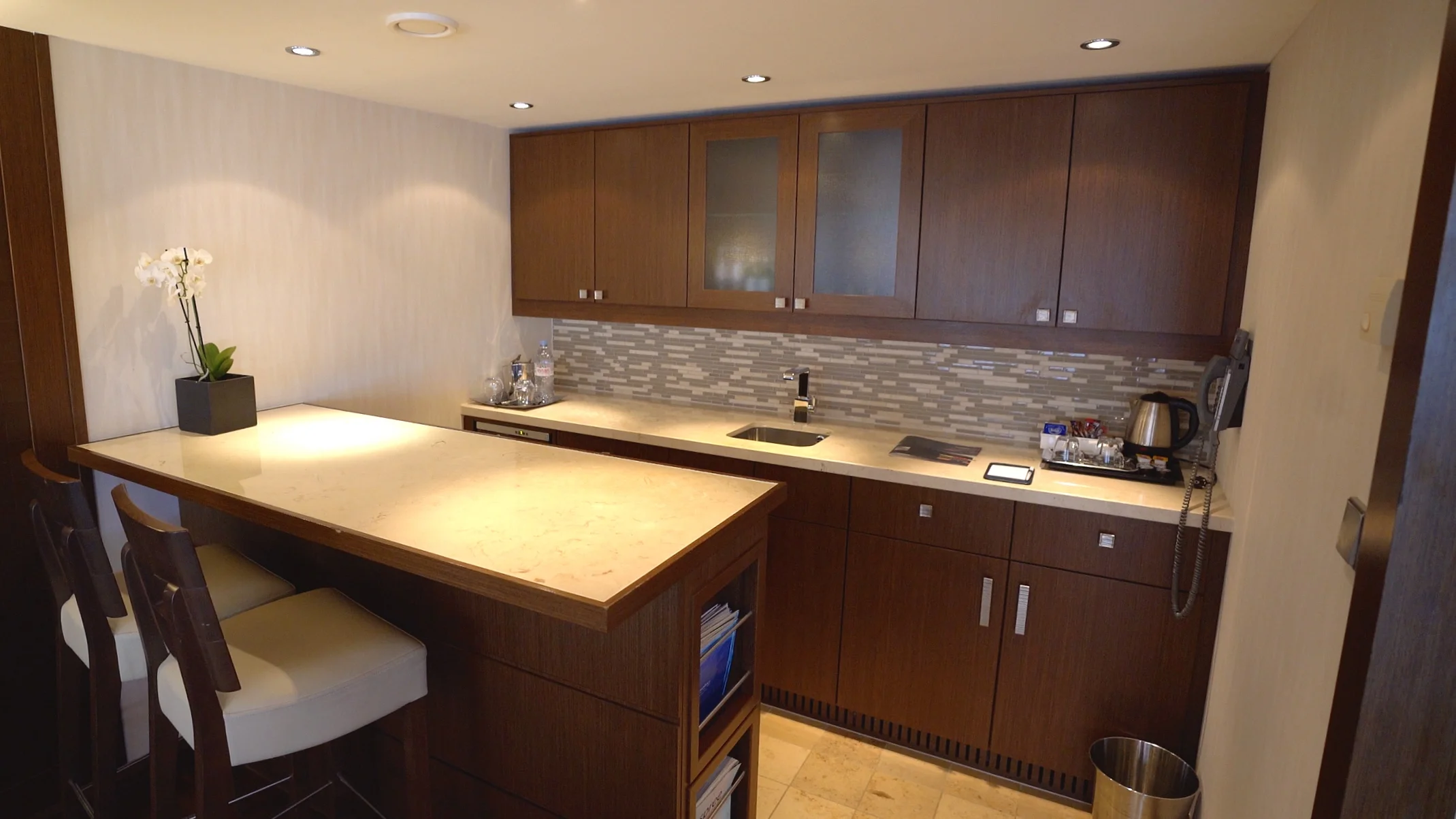 The kitchen and bar area