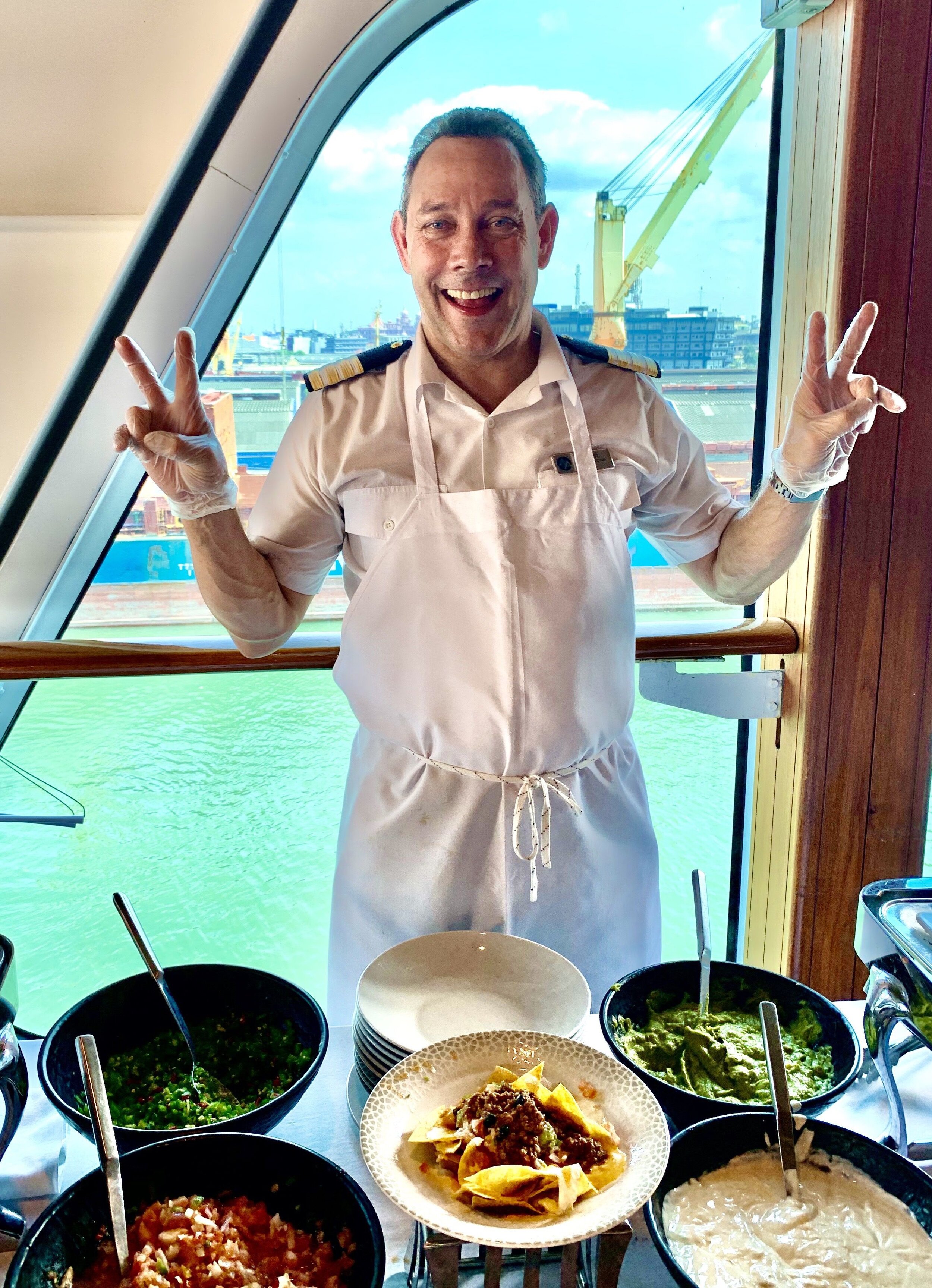 Our fabulous cruise director serving us nachos!