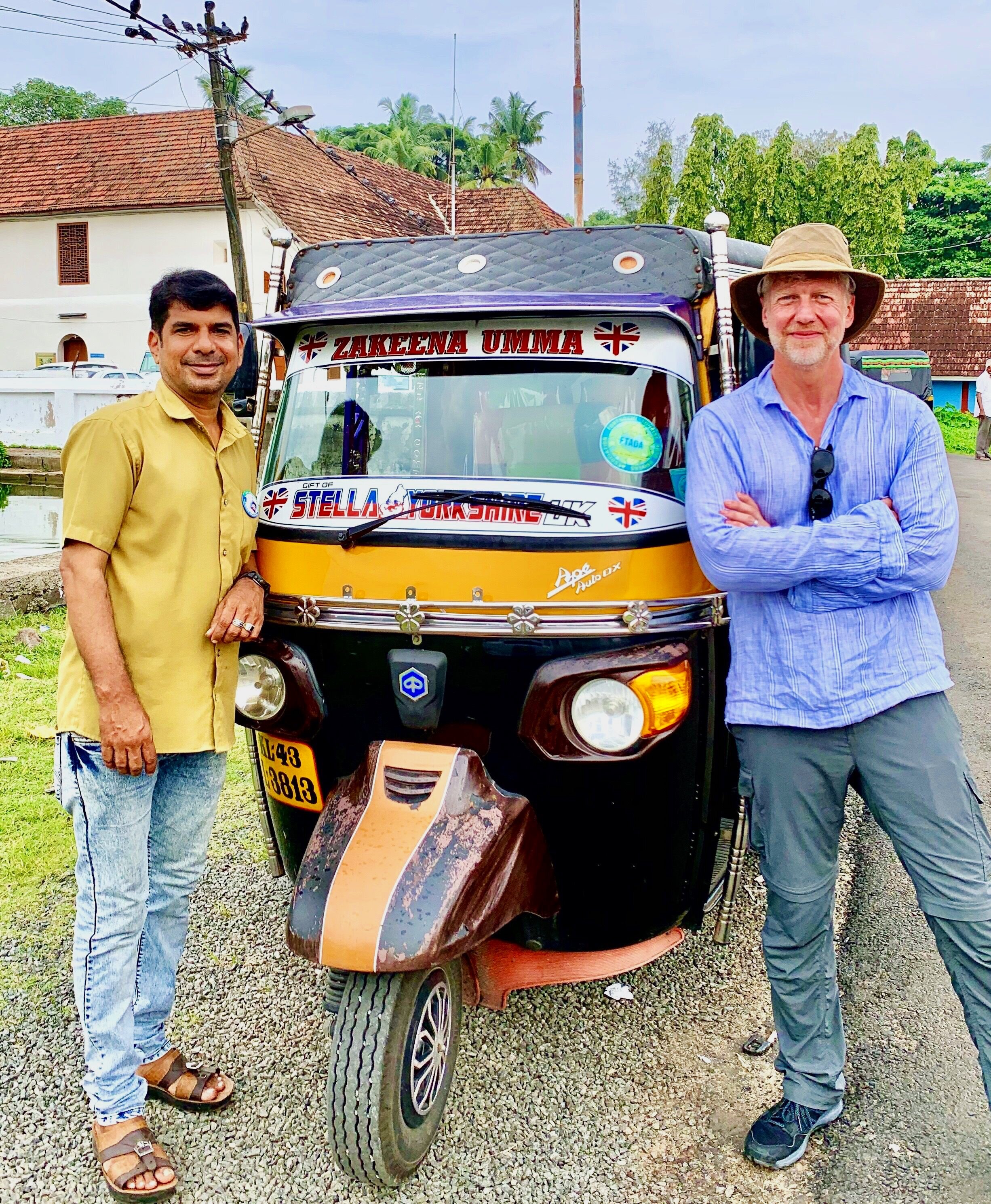 Zakki is very proud of his colourful tuk tuk. 