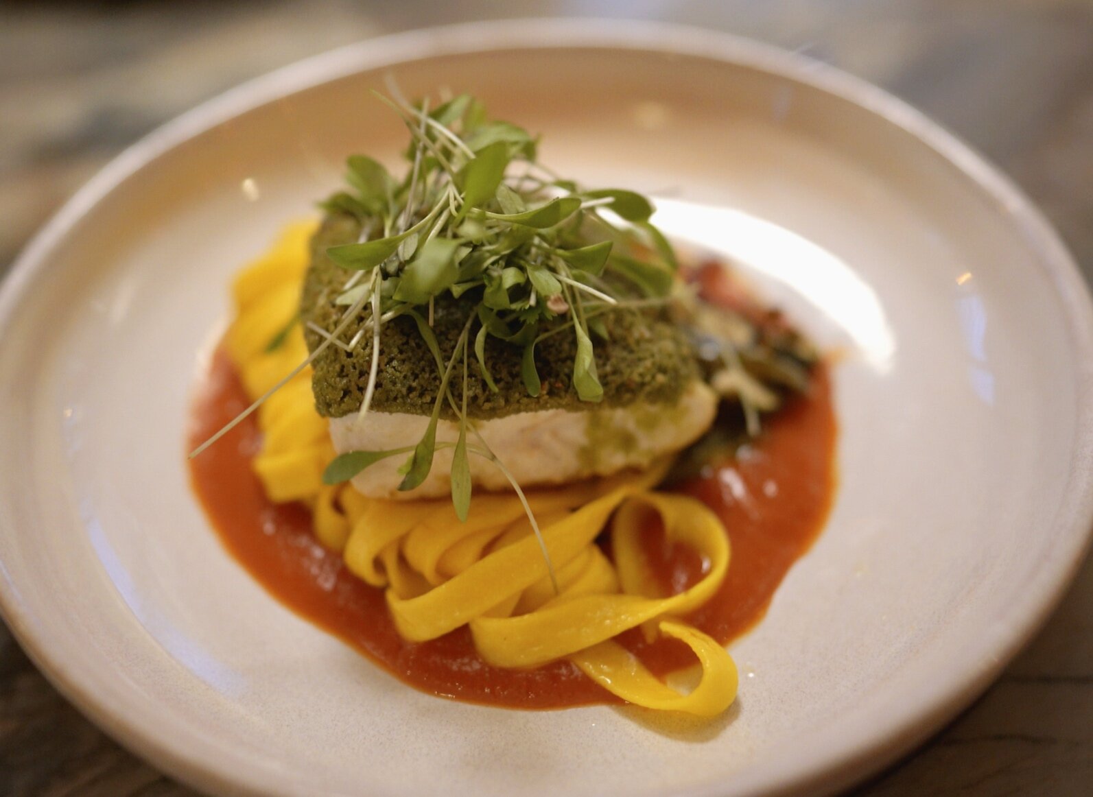 West Coast Halibut, saffron tagliatelle, confit vegetables