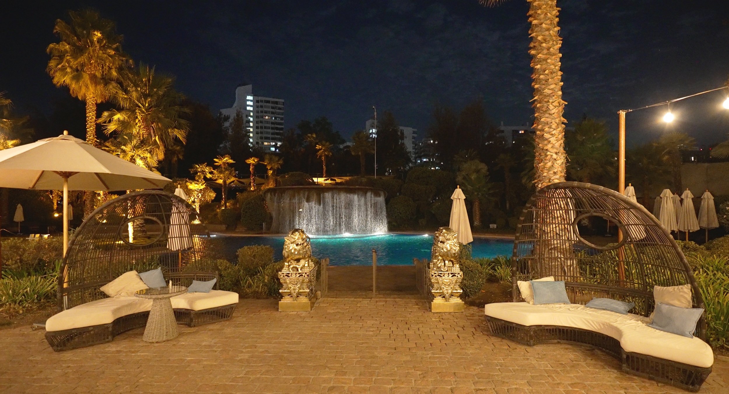 The terrace and pool at night