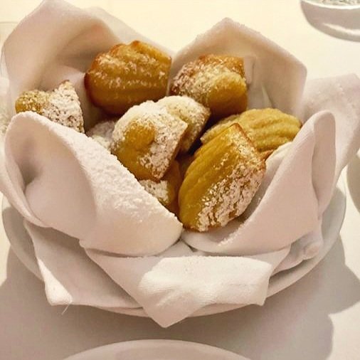  A little basket of warm madeleines 