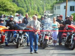 Rich Svec cutting the ribbon for the opening of the Route 131 bridge, which was damaged by Irene. 