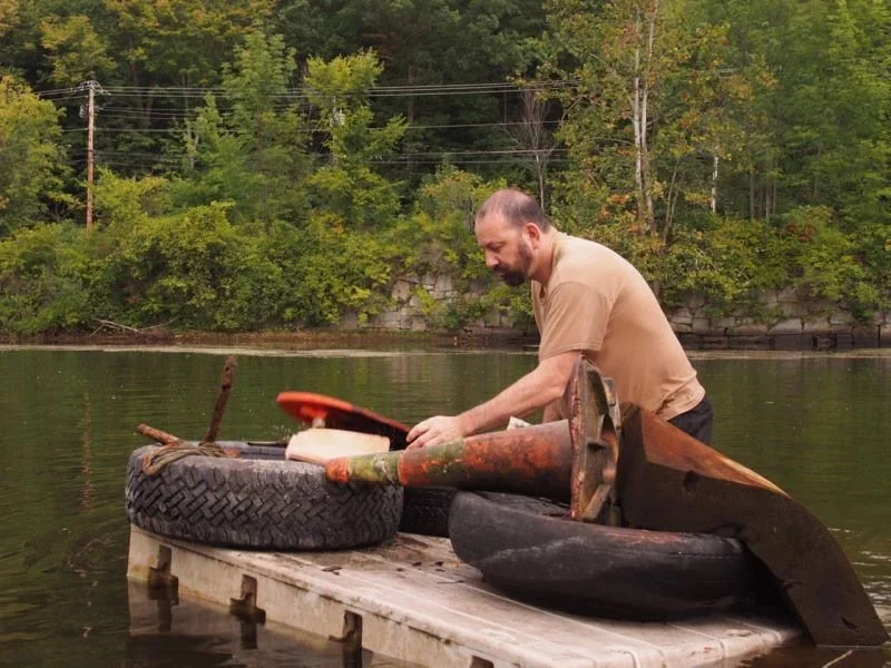 Aaron with junk.jpg