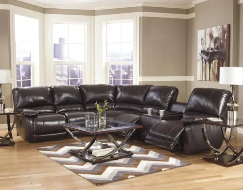 recliners and sofas inside of a living room