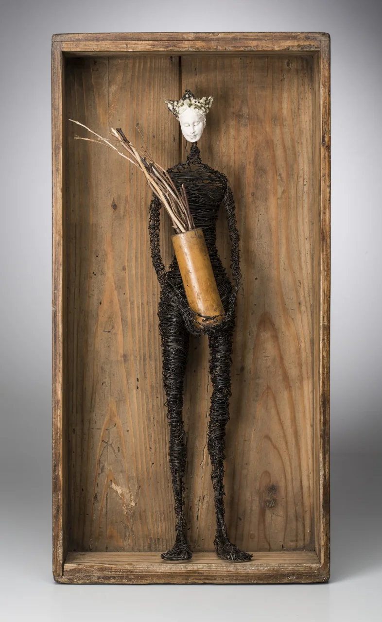 Figure in Box with Twigs