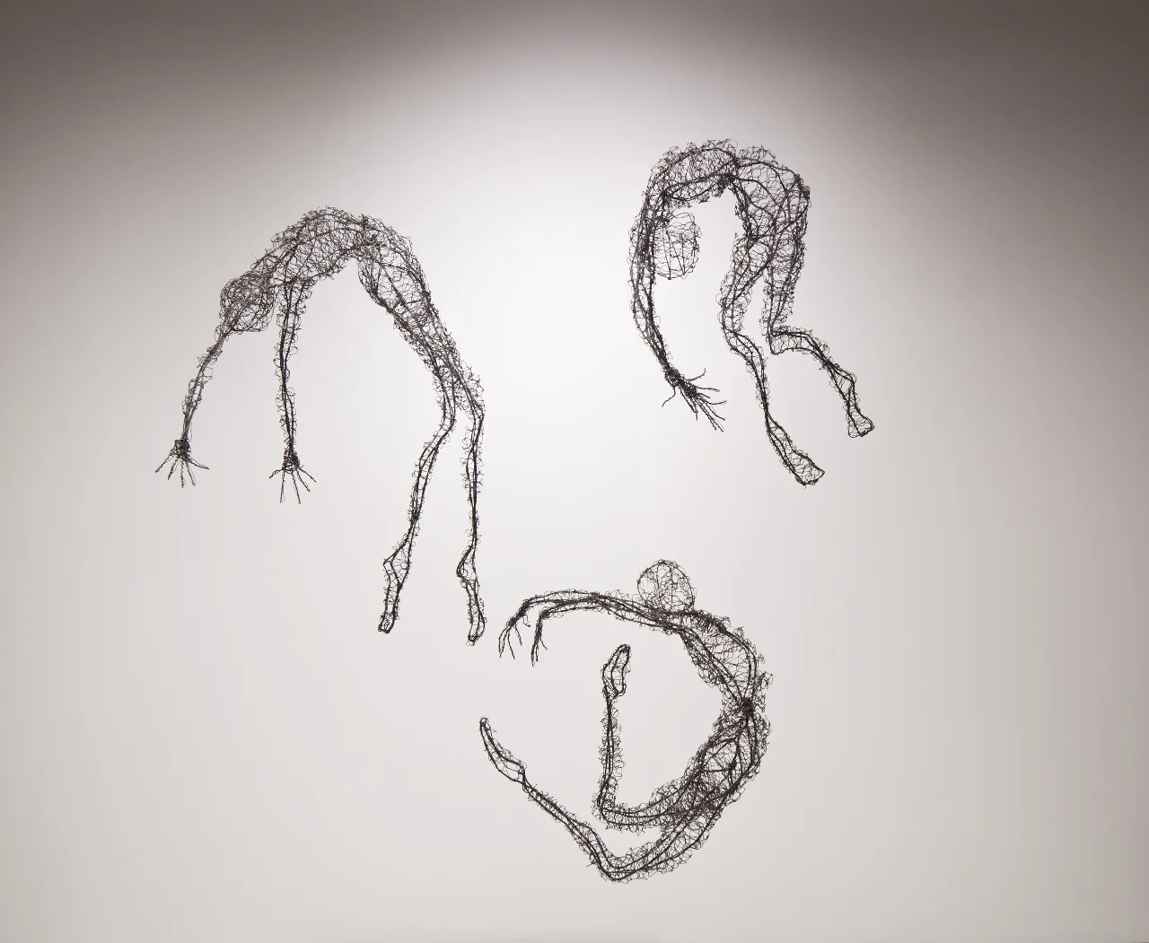 Three Leaping Figures