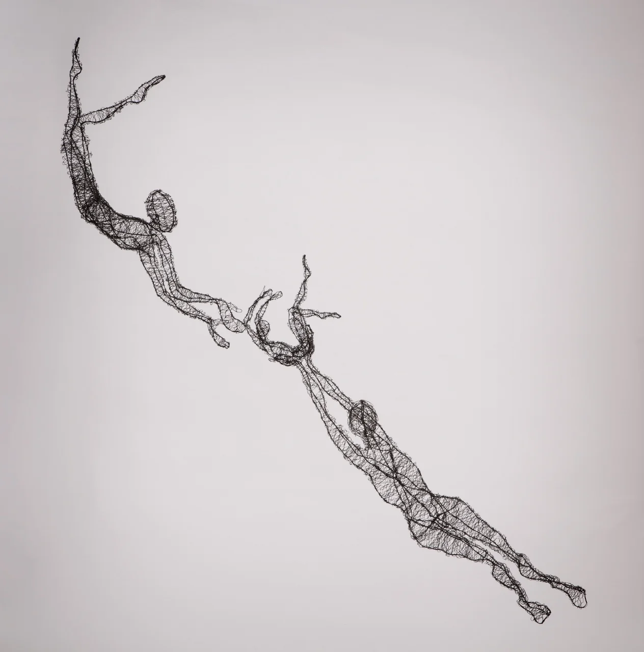 Two Leaping Figures with Small Figure