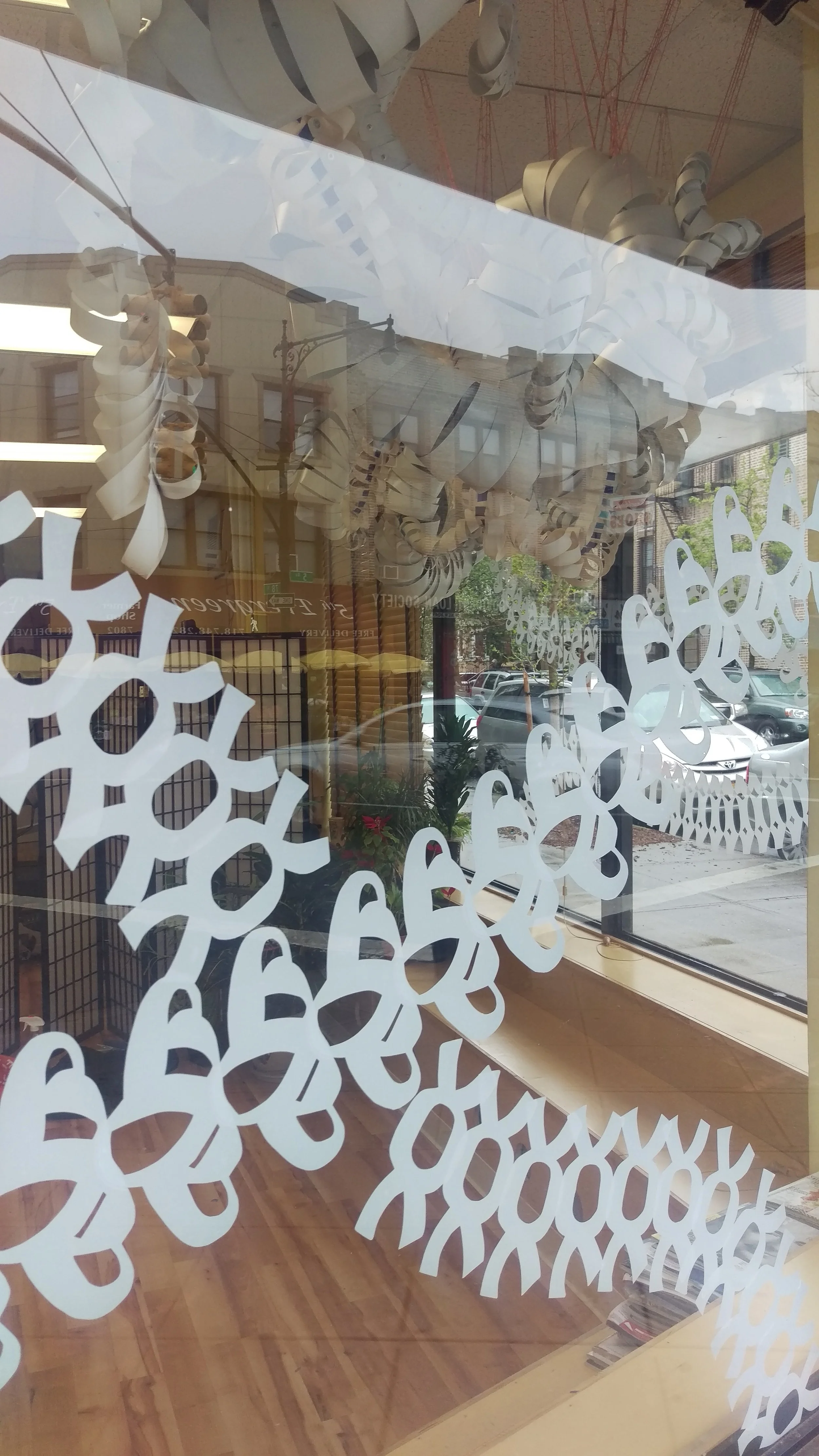 Blind Propagation 1 (detail), 2016, hand cut adhesive fabric, 24'x6' (in 4 panels). Installation at Bay Ridge Saw 2016.