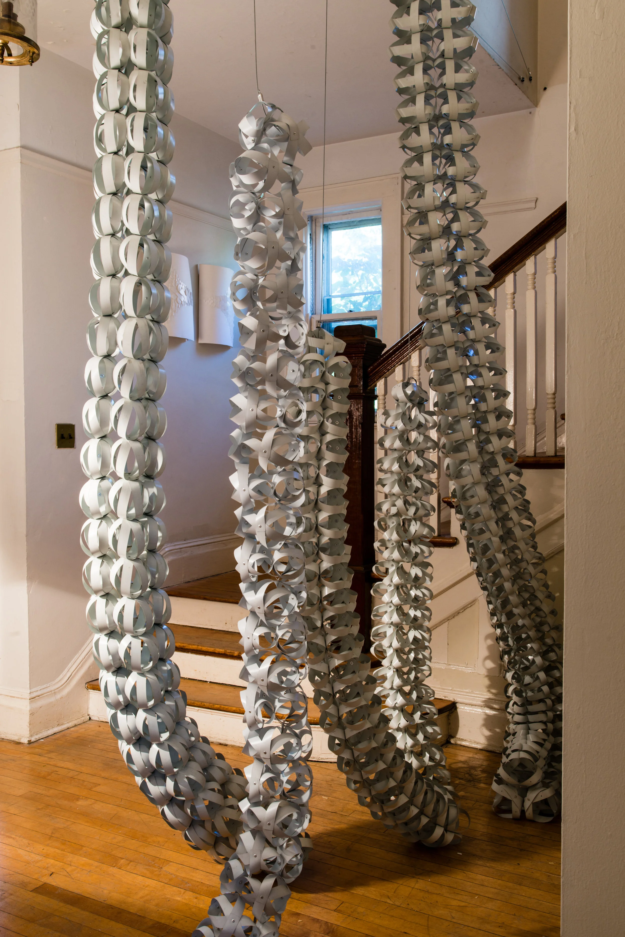 Blind Adjustment 2, 3, 7, 9, 10, 11 , 2016, aluminum blind slats, aluminum rivets, dimensions variable; as pictured 144"x 96"x 72". Installation at Governors Island Art Fair 2016