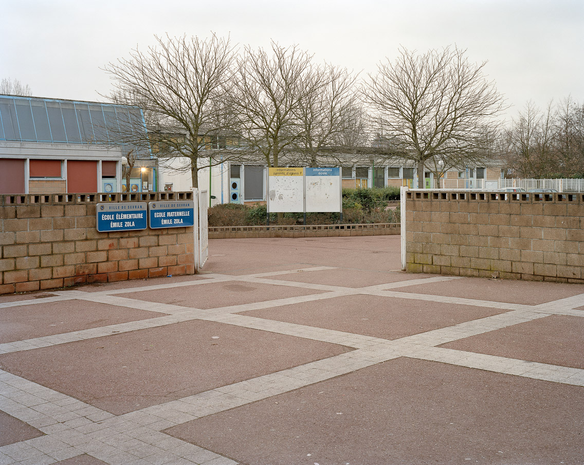   Banlieues #2 –&nbsp;Cité des Beaudottes, Sevran, Seine-Saint-Denis, 2006. 40"x50"    l'habitat marginalisé artist's statement   This school, as innocuous as it seems, was the site of an event that helped catapult the 2005 riots into the internation