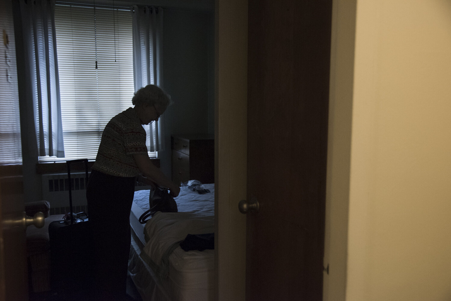  Sister Lois preparing to leave her room and convent.  St. Anthony's Convent, Soho, NYC, June 1, 2018 