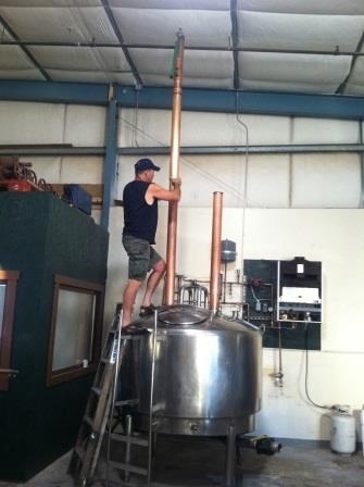 Dave installing the columns on the vodka still.