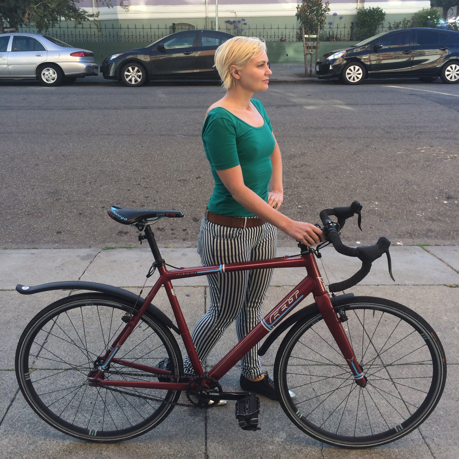 Stand with your bike on your right and position yourself about halfway between the seat and the handlebars. You will be standing on the opposite side of the chain which will help prevent accidentally greasing up your snazzy new fashion pants.