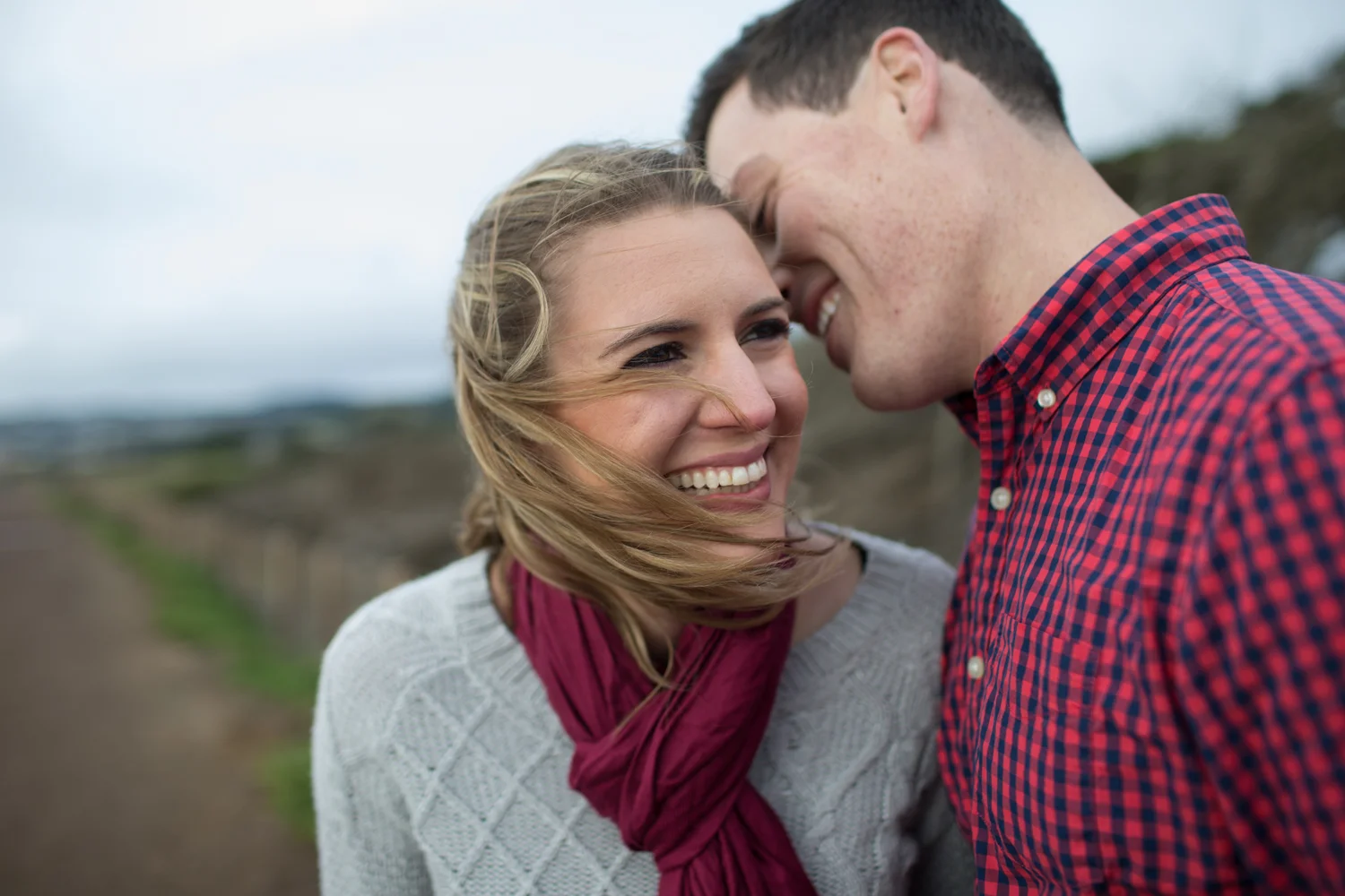 Theresa & Eric laughing at Mori Point, Pacifica