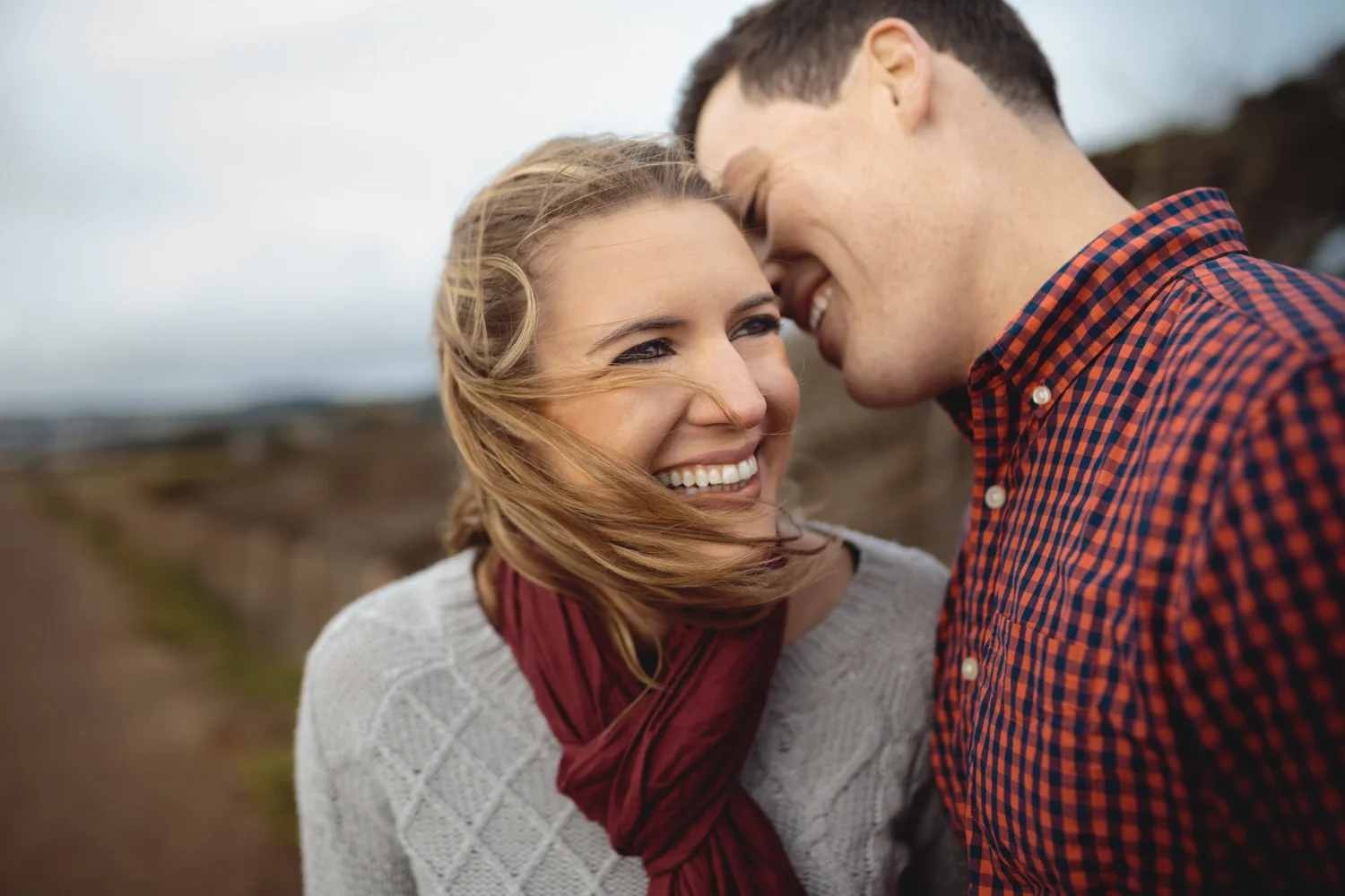 Theresa & Eric laughing at Mori Point, Pacifica