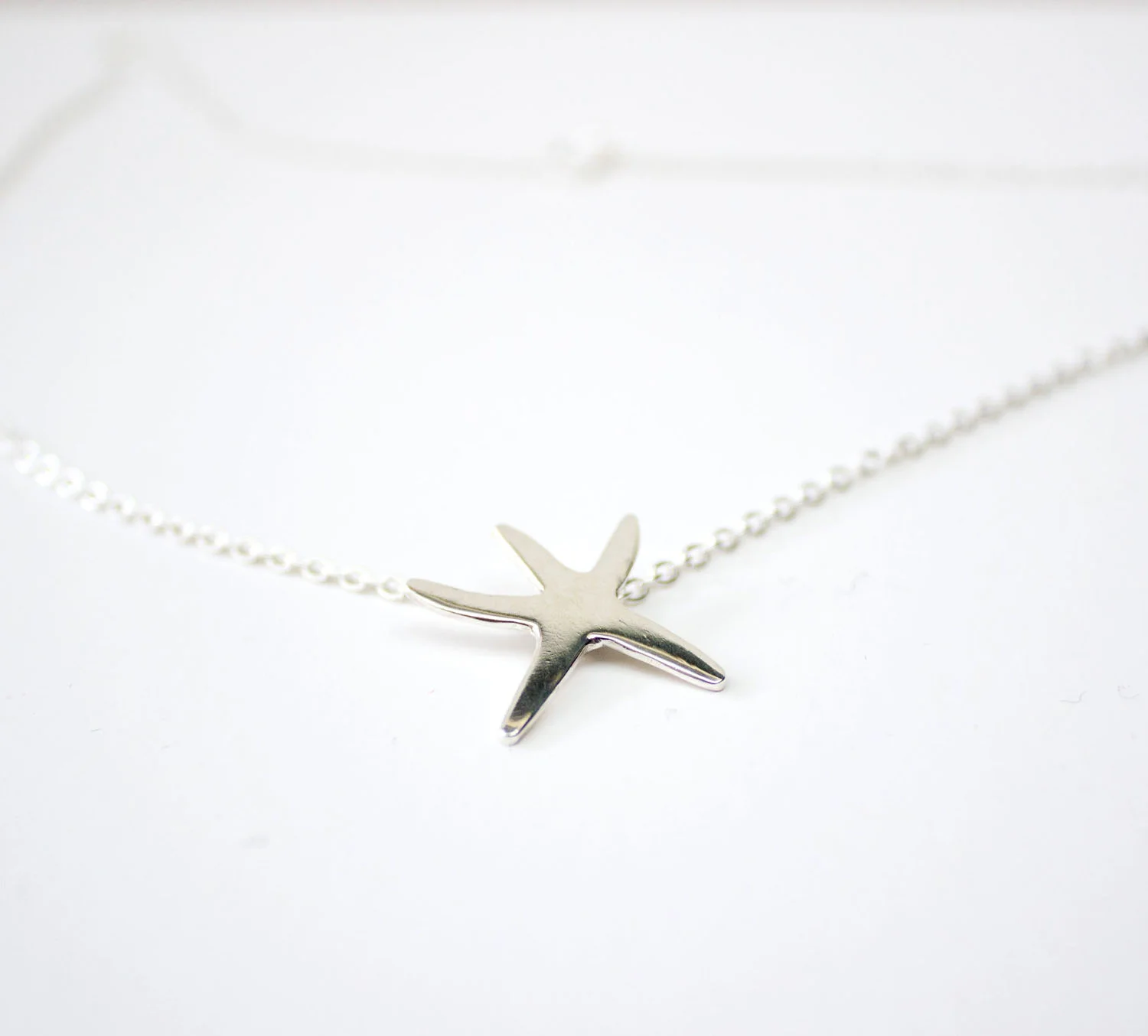 Silver Goose silver starfish pendant.jpg