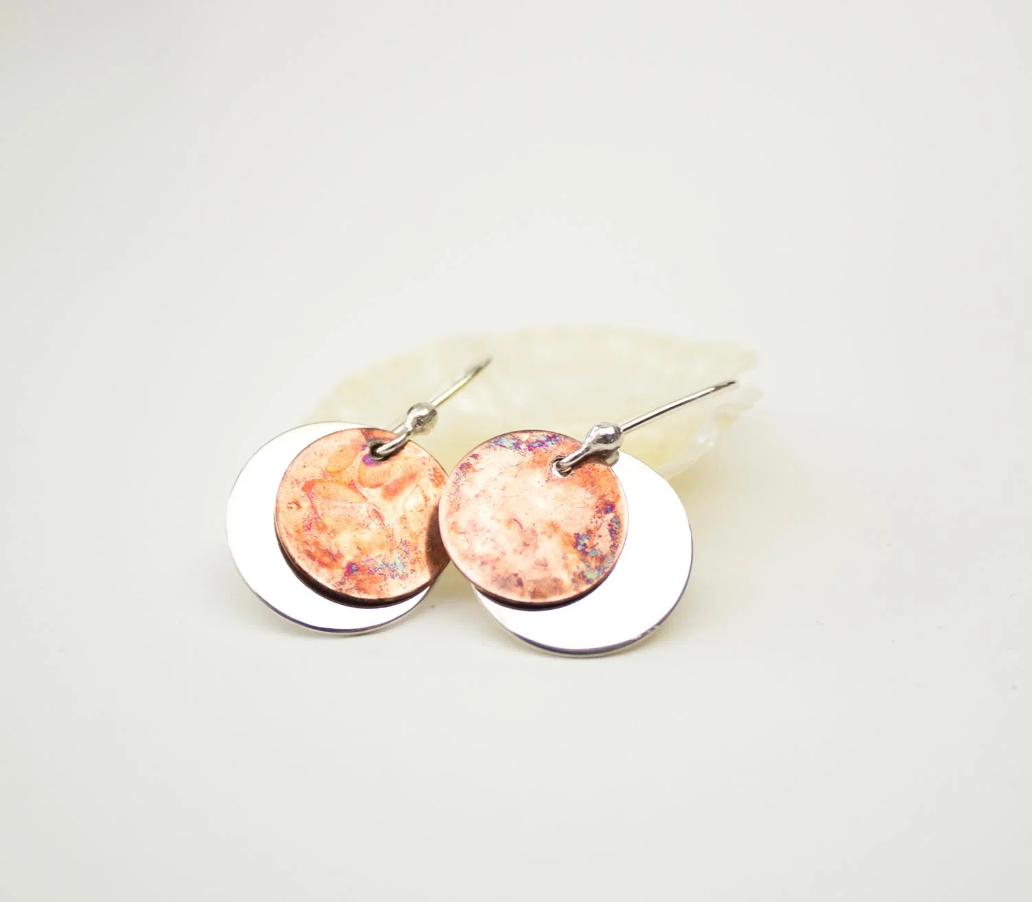Silver Goose silver copper disc earrings.jpg